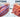 Diagram comparing TENS stimulating sensory nerves and EMS stimulating muscle fibers.