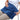 A person sitting in a chair holding a large blue plush heating pad against their abdomen.