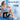 Woman wearing light blue and black knee brace with "One Size Fits Most" text