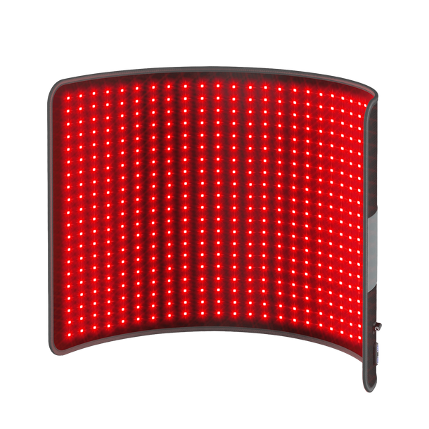 Flexible red light therapy pad with a grid of glowing red LED lights on a dark background.