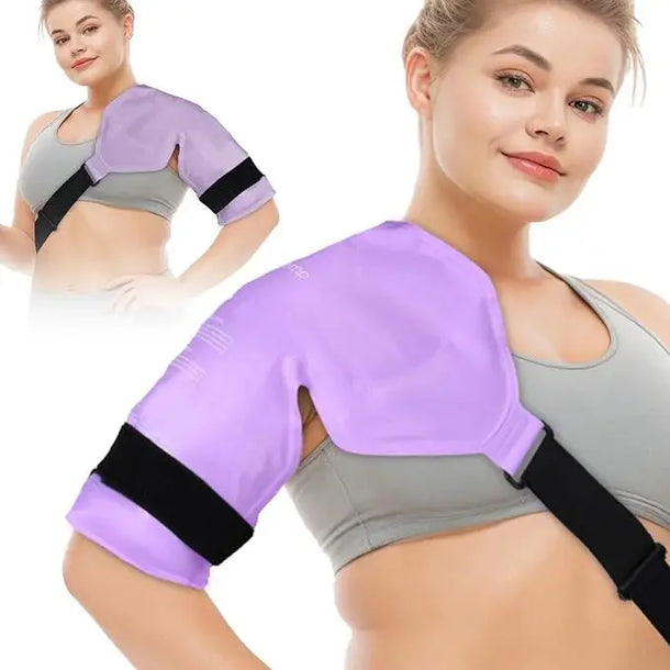 A woman wears a purple adjustable shoulder ice pack wrap for cold therapy on her right shoulder.